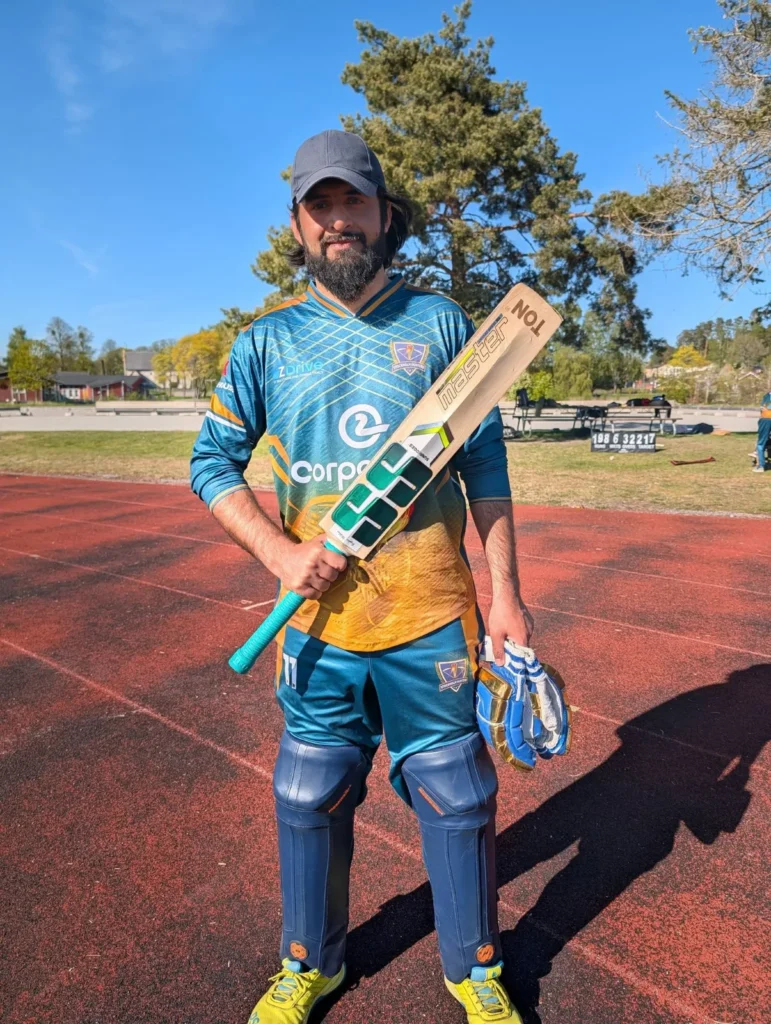 Stockholm Hunters batter holding his bat after an innings