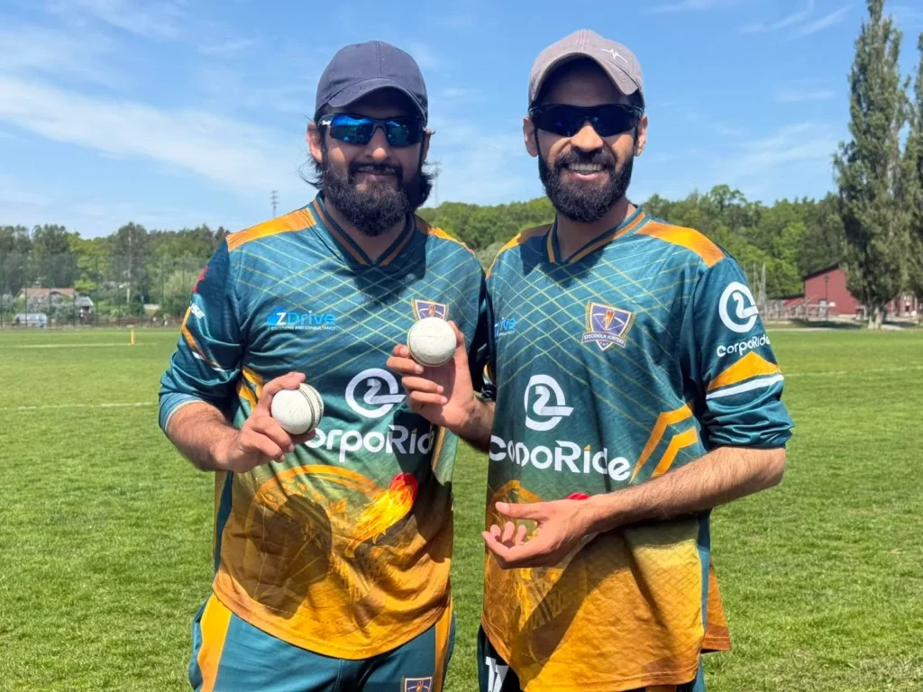 Two Stockholm Hunters bowlers holding match balls